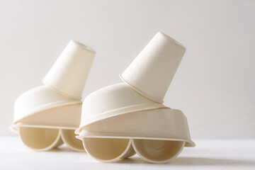 Biodegradable paper cup on white background. Eco-friendly sustainable products concept zero waste lifestyle. Minimalism simple and copy space