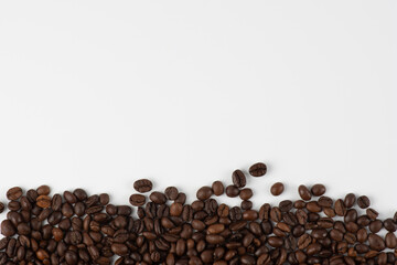 Coffee beans isolated on white background with copyspace for text. Coffee background or texture concept.