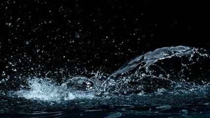 Freeze motion of water splash isolated on black background.