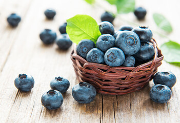 Blueberries on old wooden background