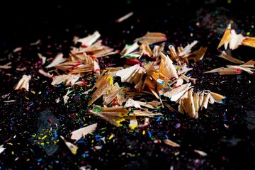 Colorful Pencil Shavings On Black Table