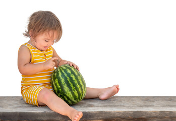 Fototapeta premium Baby playing with watermelon isilated