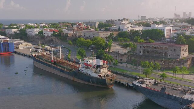 Big cargo shipping boat park in the harbour of Santo Domingo, ready to sails in the ocean for import export goods