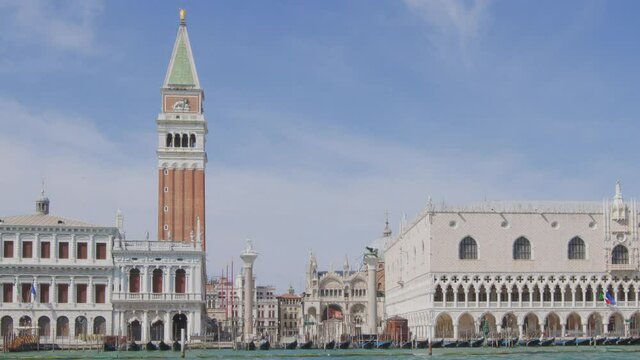 Slow motion view from the San Marco basin. You can see: Saint Mark piazzetta (little square), the columns of Marco and Todaro, Doge's palace, bell tower, gondolas, St. Mark's basilica 
