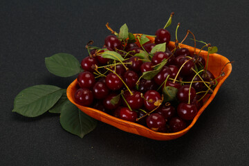 Sweet ripe cherry with leaves