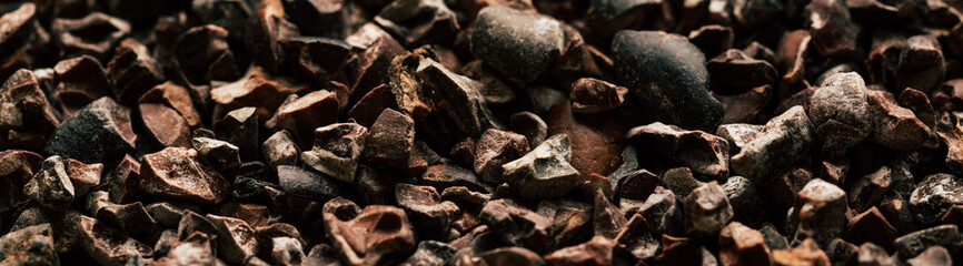 chopped cocoa beans. long horizontal banner