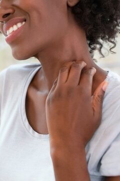 Woman Scratching Her Neck