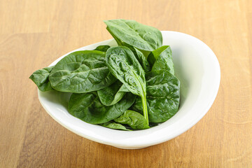 Fresh green spinach leaves in the bowl
