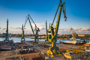 Obrazy  Shipyard Crane in Gdansk at sunset. Poland