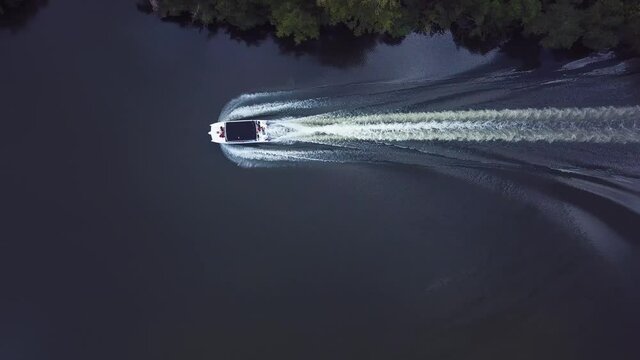 Boat In The River Maked With Drone Cental Shoot