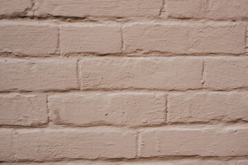 texture of old brickwork painted with gray paint. Weathered background. background consisting of horizontal part of gray painted brick wall.