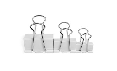 Binder clips on white background, top view. Stationery item