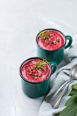 Seasonal fall autumn creamy beetroot soup on a table