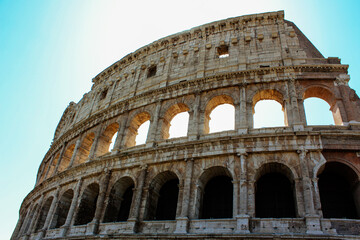 Fototapeta premium Walls with arches of the ancient arena of the Colosseum in Rome