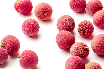 Closeup of fresh lychee on white background.
