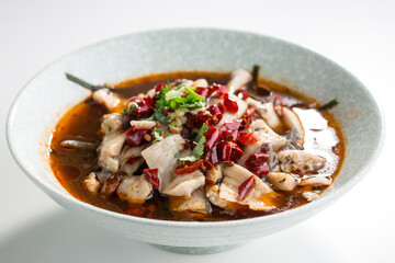 Fish soup with herbs and chili pepper asian food isolated on white background