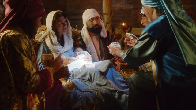 Magi Giving Presents To Baby Jesus