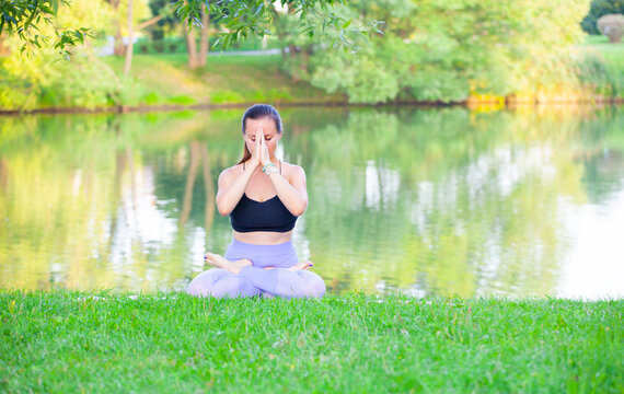 image of woman yoga lake background