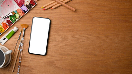 smartphone mockup, water colour, painting tools, copy space for display your art work on wood work table