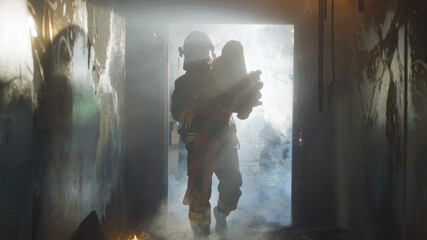 Fireman carrying kid heroically through smoke and fire