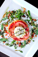 Appetizing starter on a white plate 