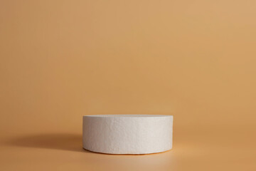 Copy space empty white coasters podium on a beige background. Blank unbranded shopfront. Product advertisement. Fashion, beauty, care, trend concept.Scene with Minimal geometrical forms.