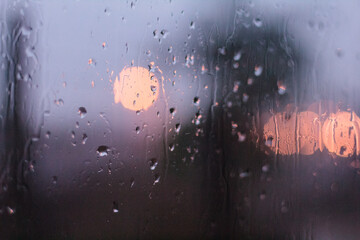 raindrops on a cloudy glass