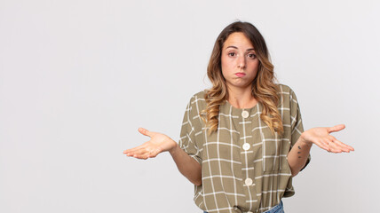 pretty thin woman feeling puzzled and confused, unsure about the correct answer or decision, trying...