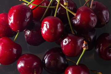 Ripe cherries on a solid background, healthy vegetarian food. Beautiful