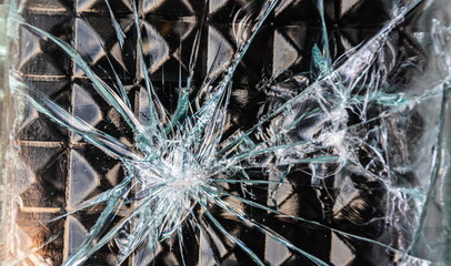 fragment of an old wall made of cracked blue glass bricks as a background texture composition