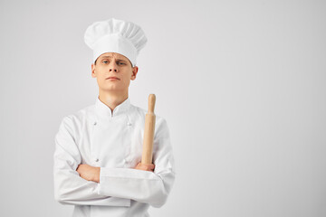 man in chef's uniform cooking food kitchen restaurant cooking