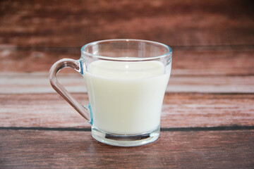 white milk drink in a transparent glass