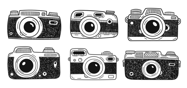 Collection of Photo Cameras isolated on white background. Hand drawn doodles. Vector illustration.