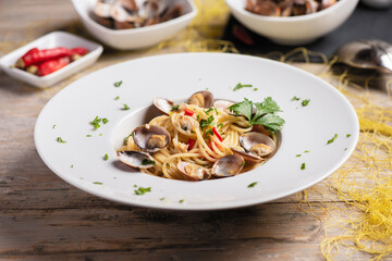 Italian food. Spaghetti with clams Juicy, garlic. Close up