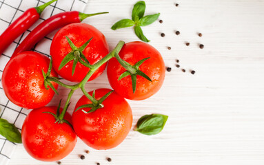 Fresh tomatoes on the table. Cooking process. Close-up. Top view. Copy space.