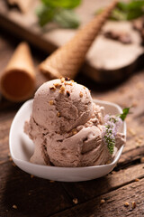 Scoops of Chocolate and Vanilla Ice Cream on Plate