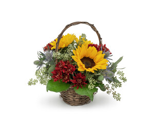 Autumn bouquet of flowers in basket with Sunflowers Eucalyptus and Chrysanthemums - Fall season mixed flower arrangement designed by a professional florist at a flowers shop