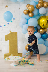 Baby boy eat blue smash cake