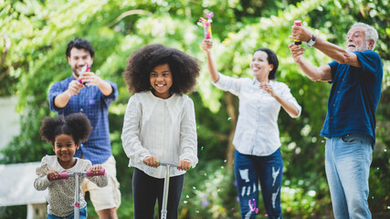 big family group with children and parent many generation meeting at home. mother father and senior...