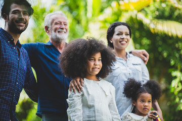 big family group with children and parent many generation meeting at home. mother father and senior grandfather having relax and happy together with daughter kid