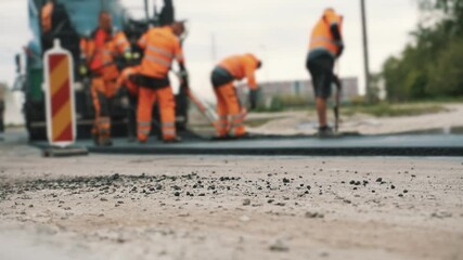 Road construction. Road workers on the street.