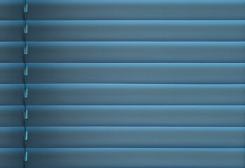 Close-up photo of blinds installed in windows.