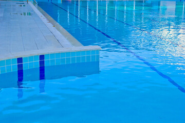 Fototapeta na wymiar blue swimming pool in a resort in antalya, turkey