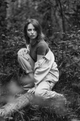 Beautiful young woman in forest