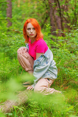 Beautiful young woman in forest