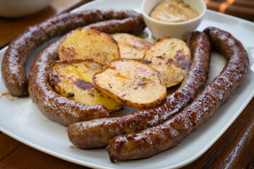 Croatian truffle grilled sausage with baked potatoes