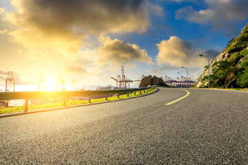 Empty and clean asphalt roads and pier industrial landscape in summer, Asia