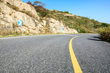 Empty and clean asphalt road and natural mountain landscape in spring, Asia