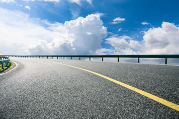 Empty and clean asphalt road and sky landscape in summer, Asia
