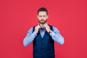 charismatic unshaven ceo. confident boss. mature businessperson in suit.
